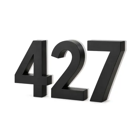 Halo-lit house numbers 4, 2 and 7 in matte black stainless steel, unlit, on a white background