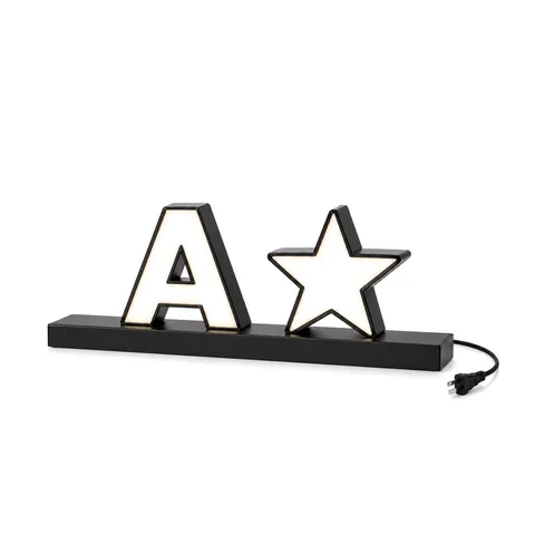 Small tabletop sign: a lit letter A and a star on a slim black metal base with a power cord, on white