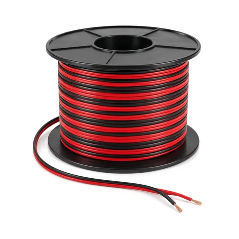Spool of flat red and black two-conductor low-voltage wire with stripped copper tips at the loose end, on white