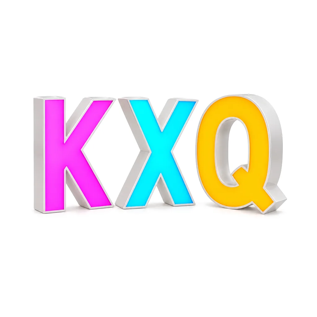 Three RGB front-lit channel letters K, X and Q glowing magenta, cyan and amber, with white returns